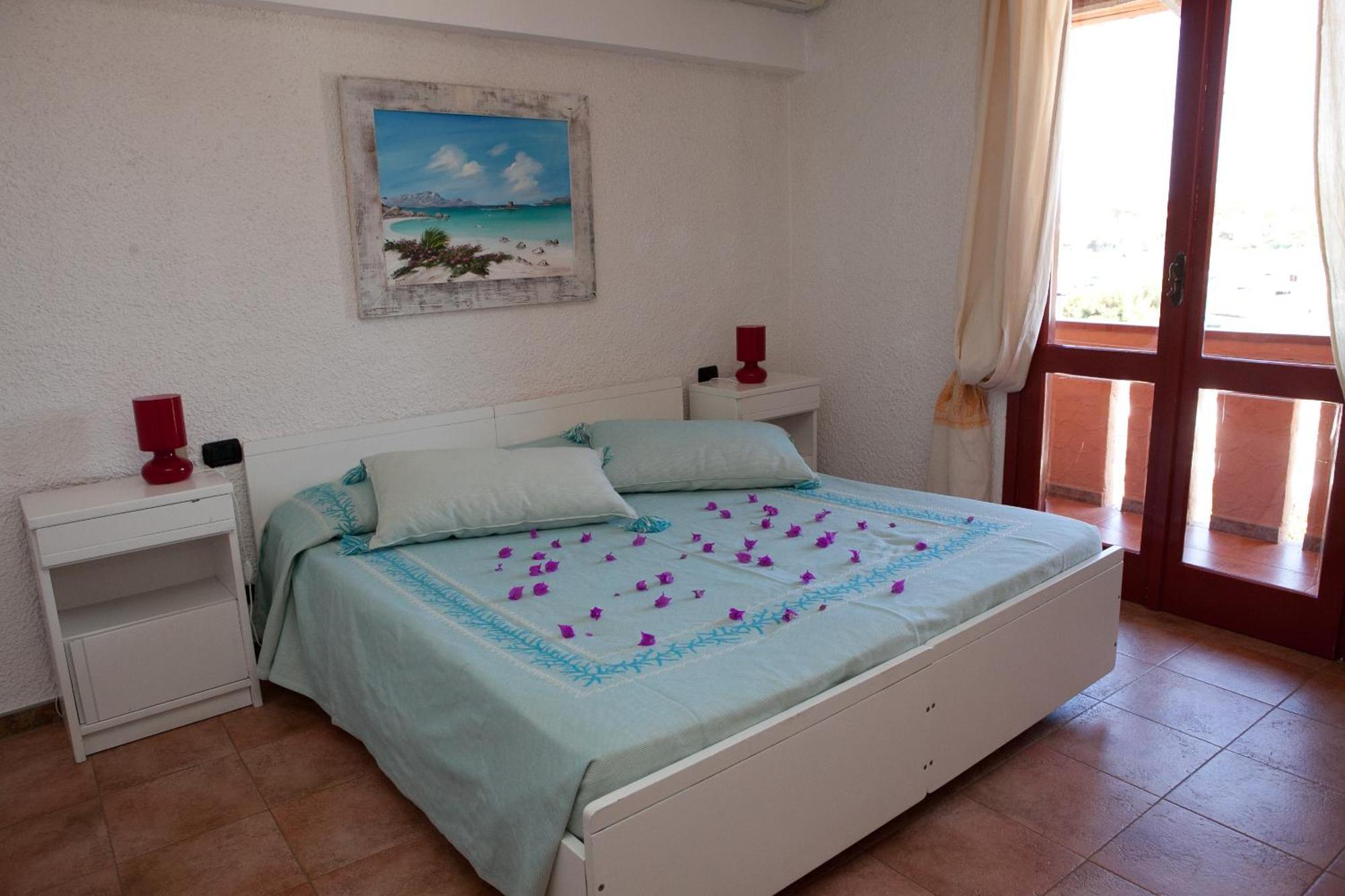 Club Esse Cala Bitta Hotel Baja Sardinia Exterior photo